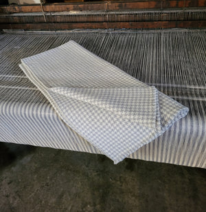 Light Grey and Natural White coloured Yorkshire Lambswool in traditional houndstooth pattern